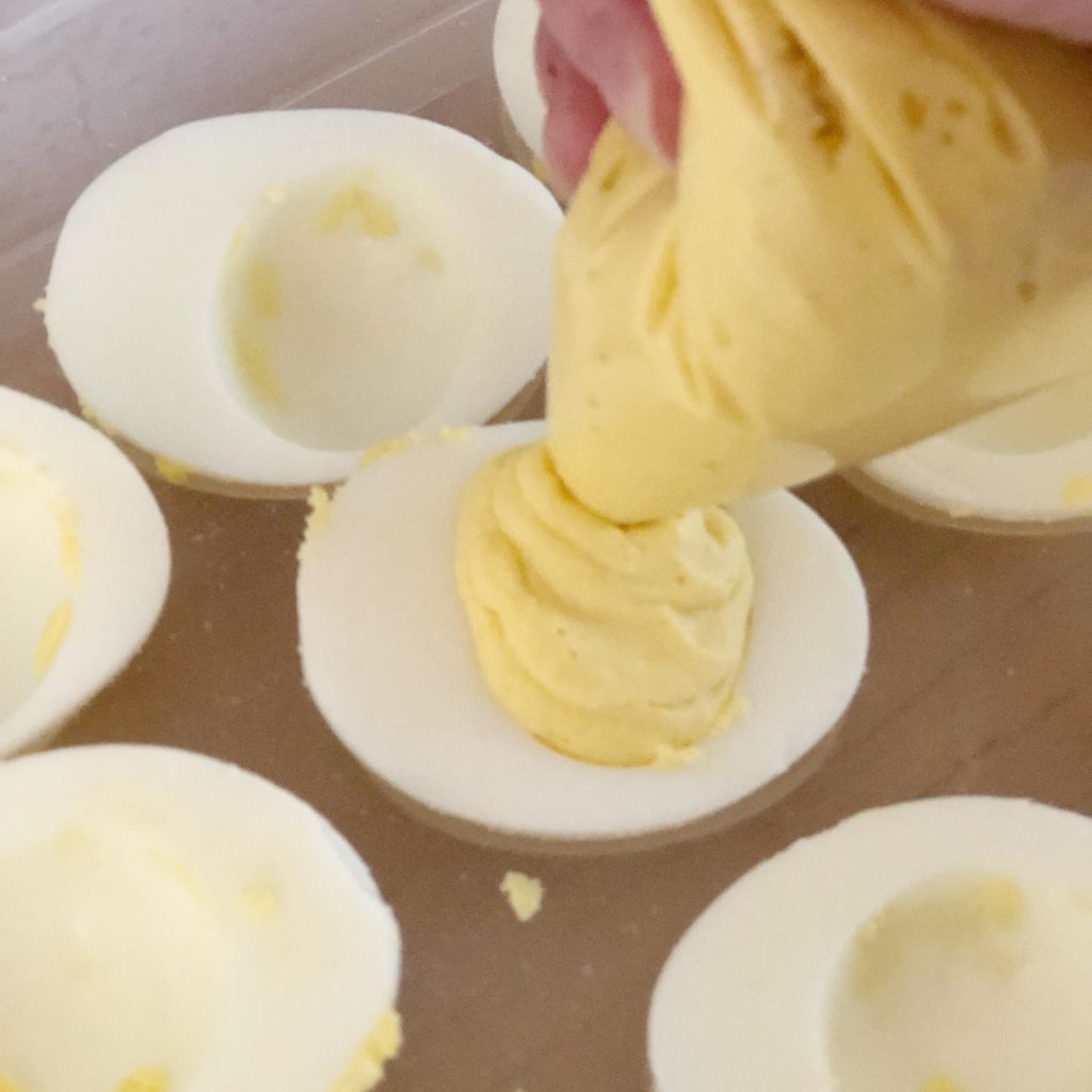 put yolk in egg