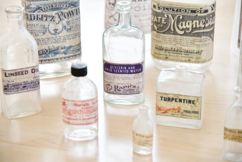 Close up of vintage bottles with labels DIY