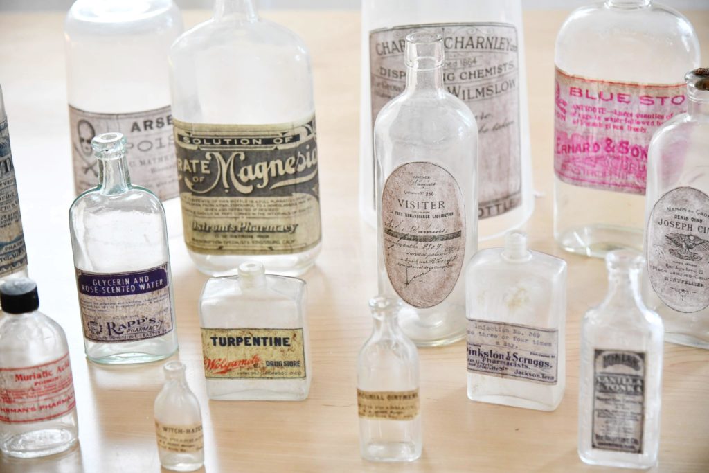 Group of vintage bottles with Labels