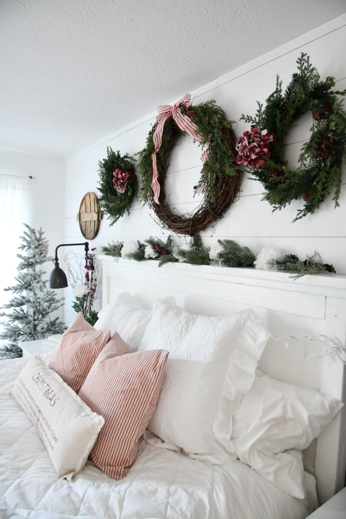 Three large wreaths on wall Christmas bedding