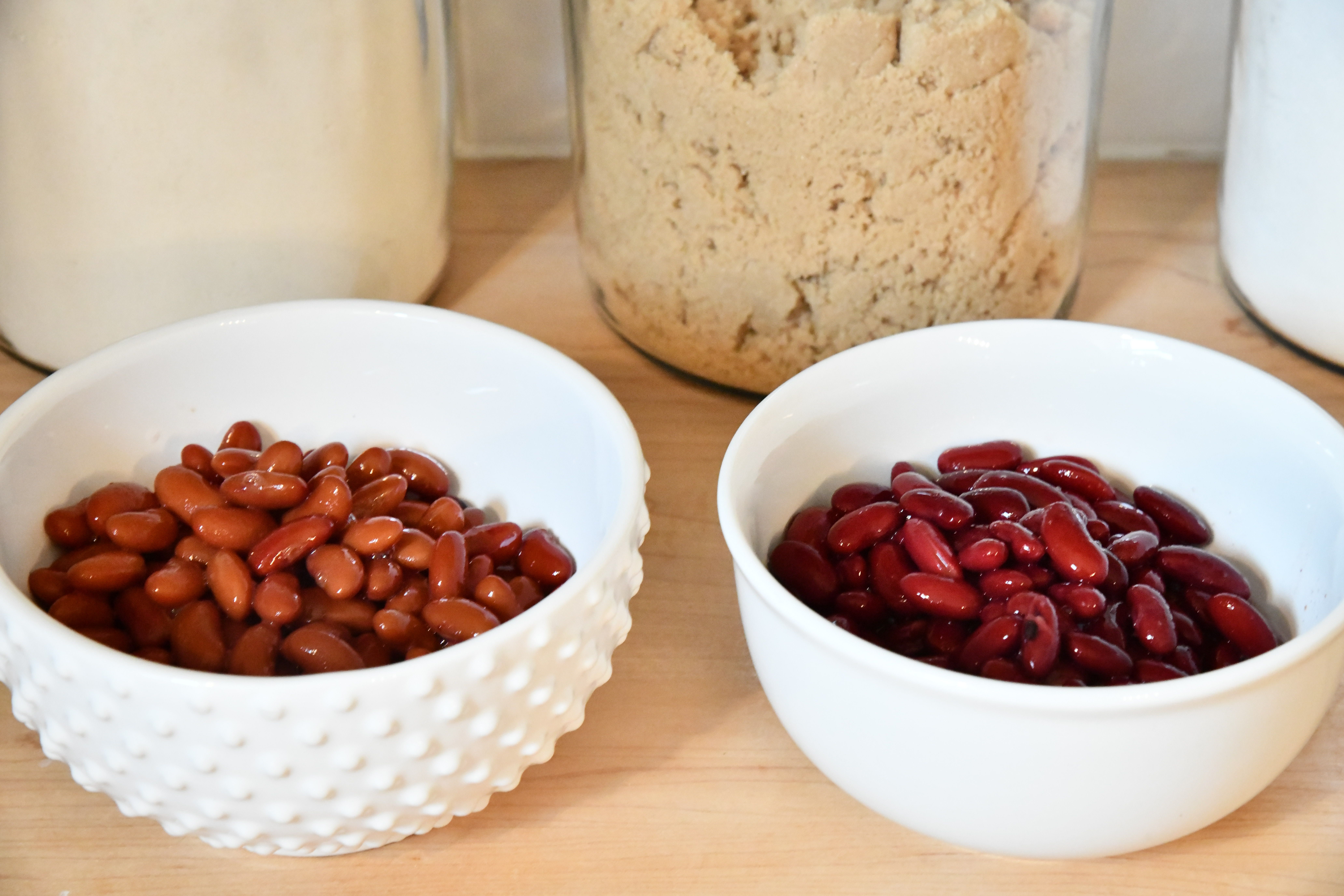 Kidney Beans in white bowls on counter