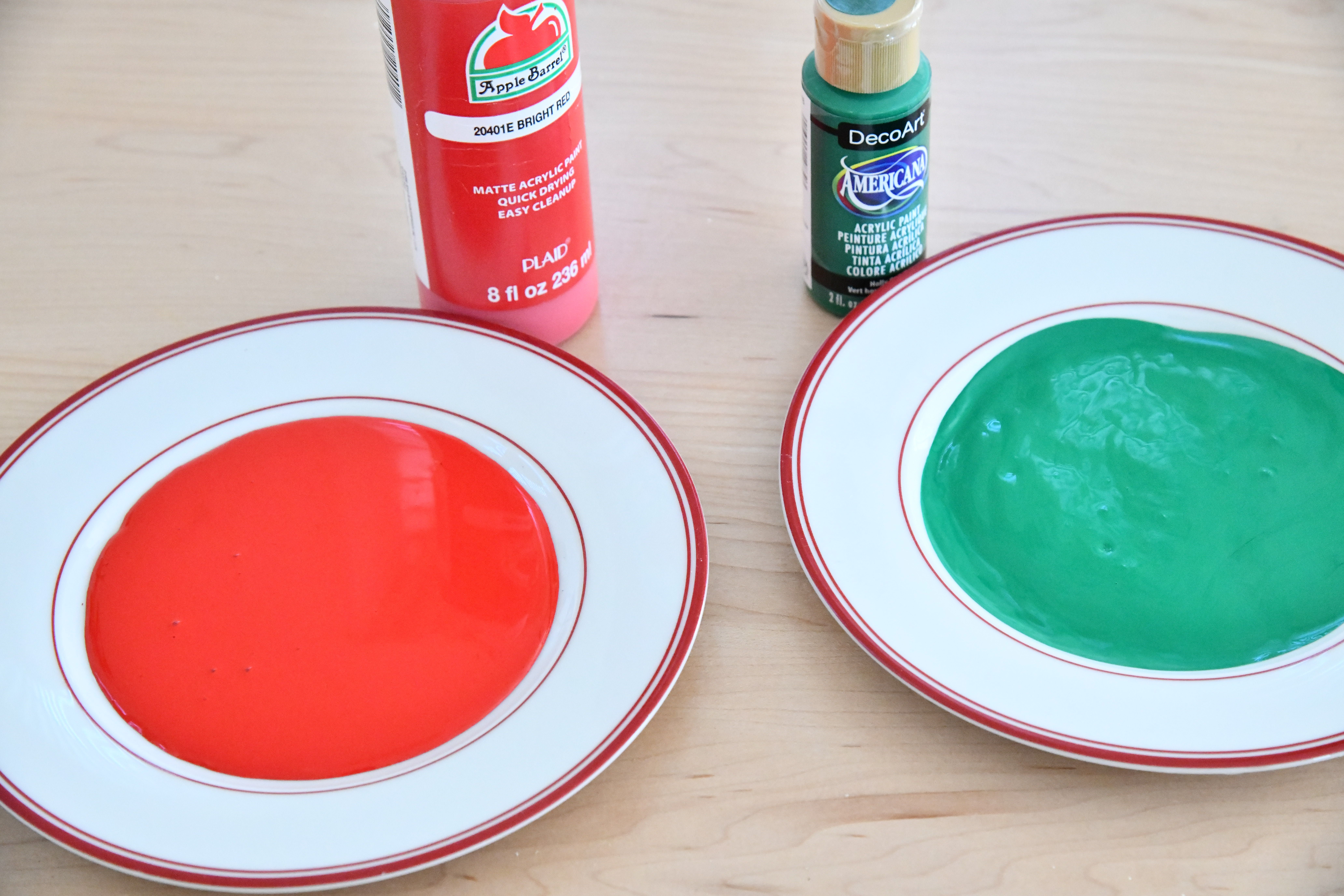 red and green paint on plates on table