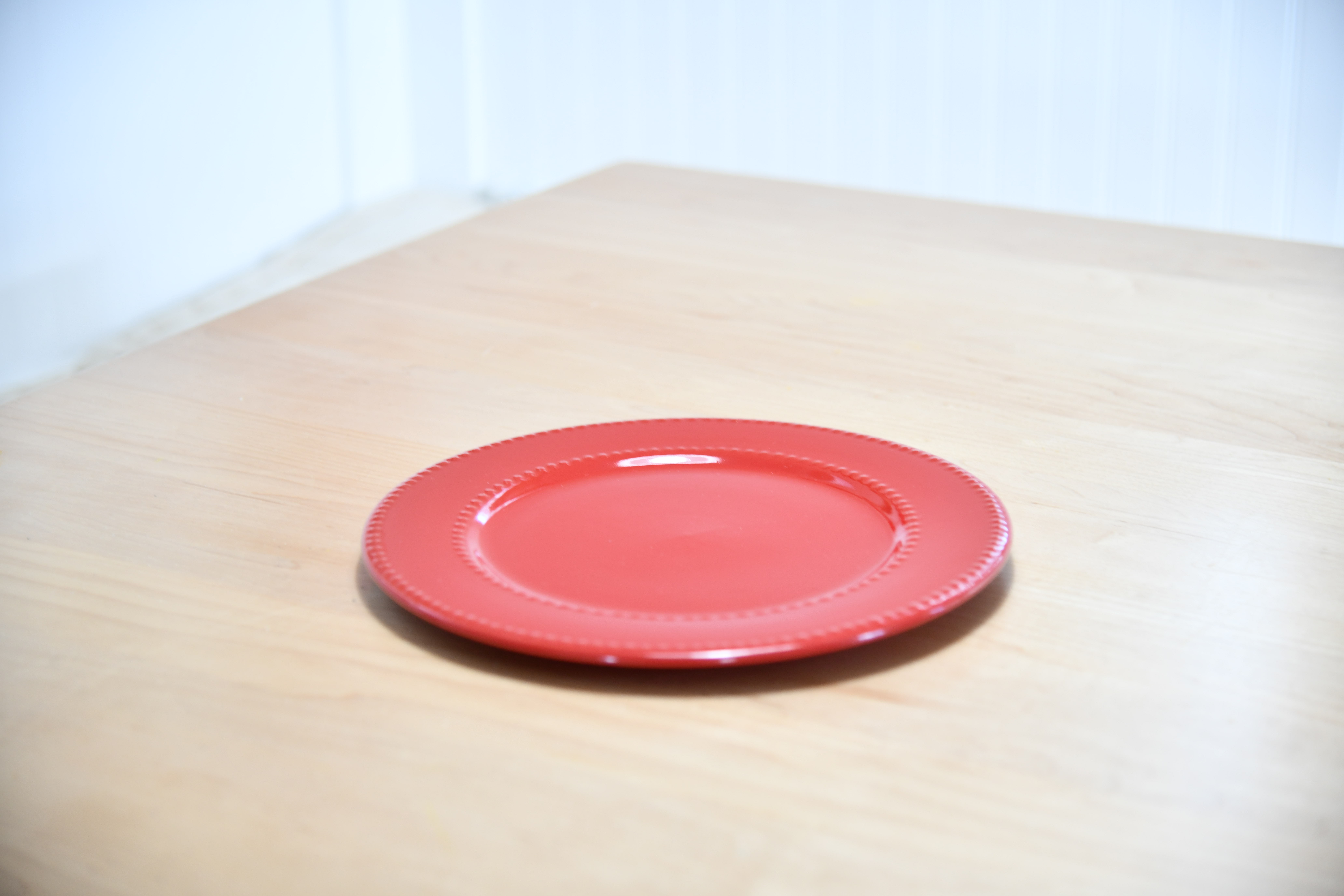 Red Plate on Table for Dollar Store DIY Cake Stand