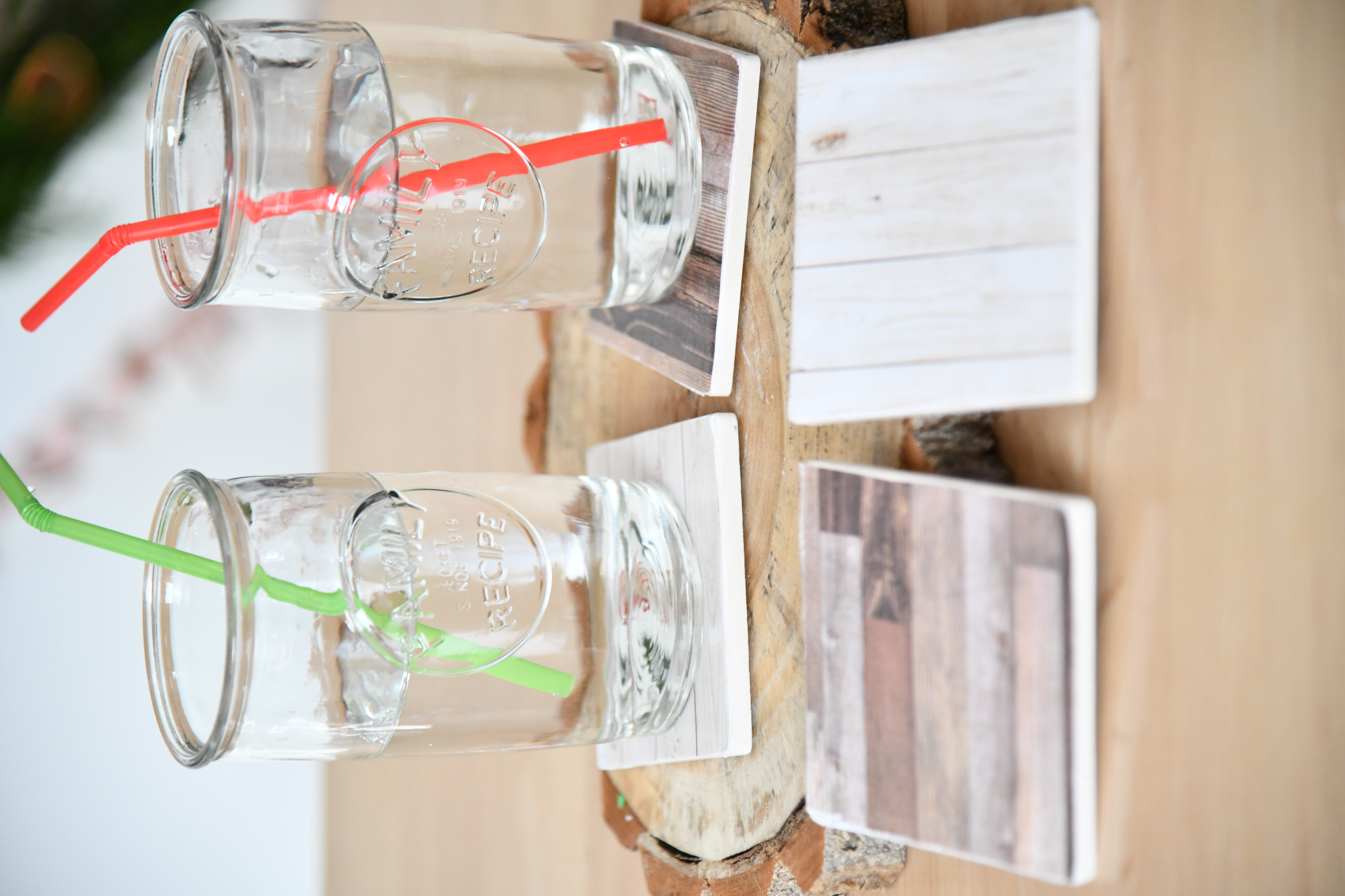 DIY Farmhouse Coasters on Table with Water and straw