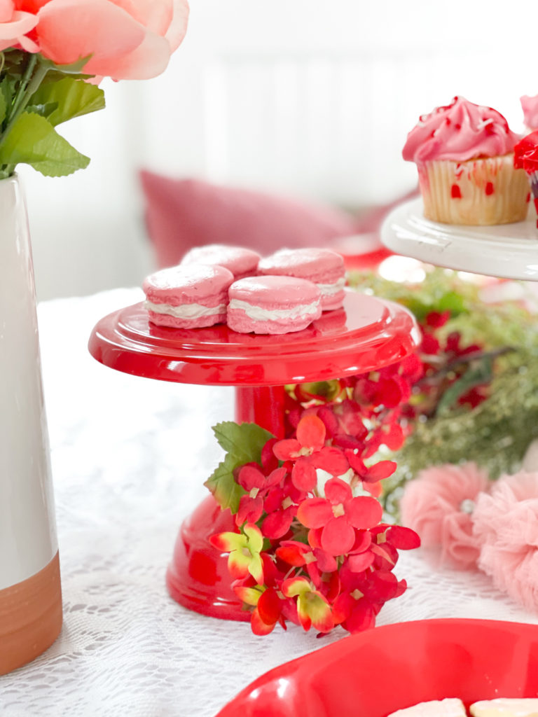 Valentines table decor red cake stand with macaroons 