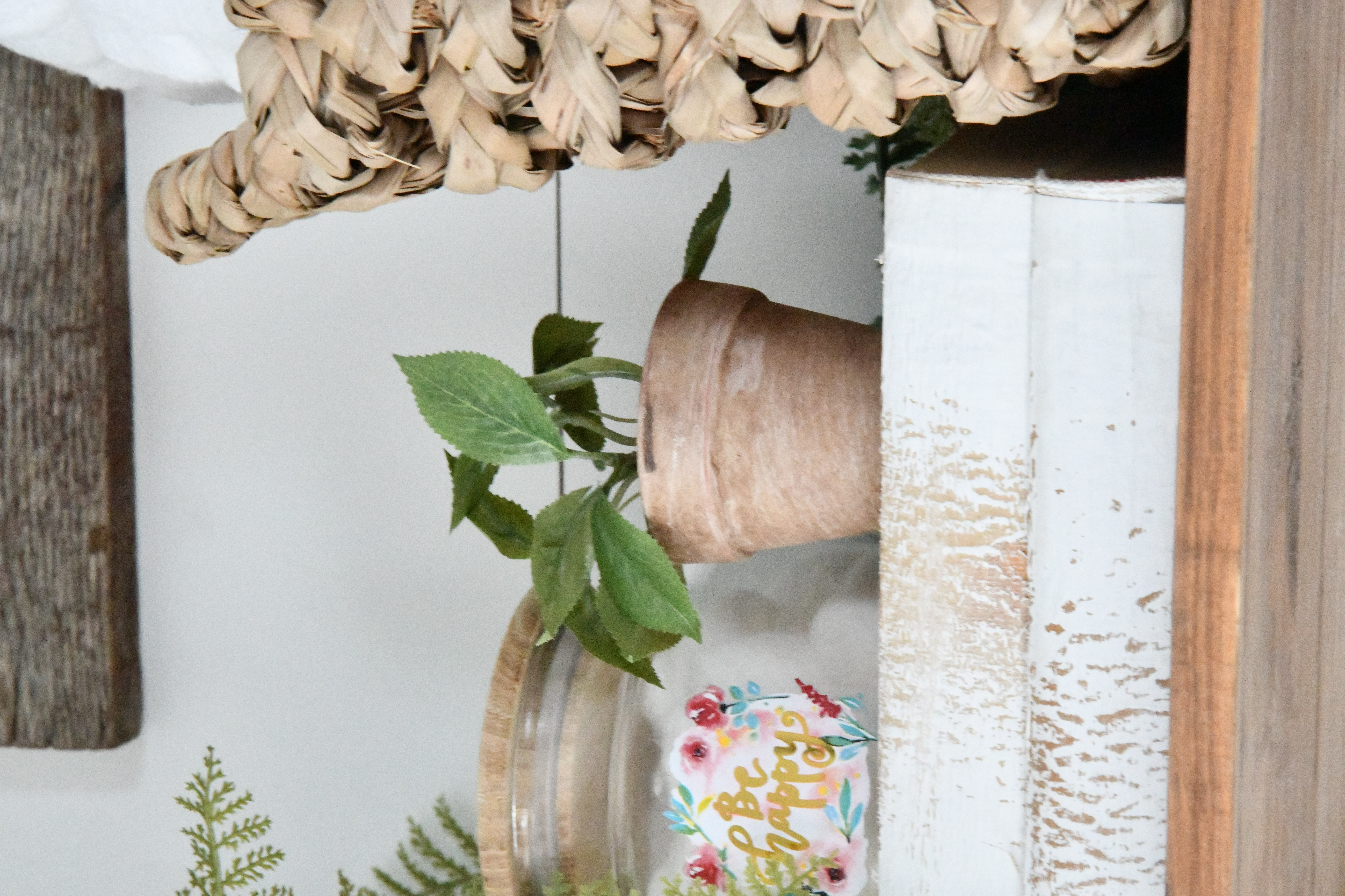 How To Style Your Bathroom Shelves for Spring add in some height