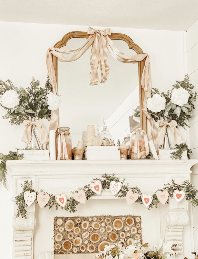 how top decorate your mantle for valentines day diy vintage card garland How To Decorate Your Valentine's Day Mantle Like a Pro