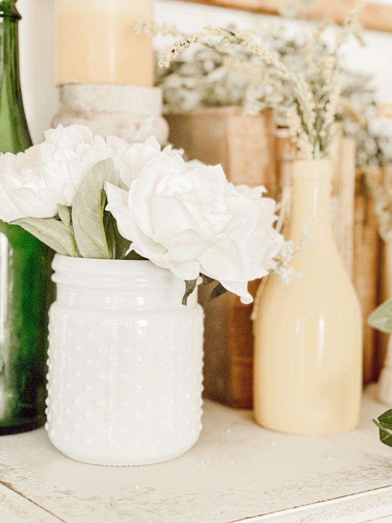 How To Decorate Your Summer Mantle Like a Pro hobnail vase white flowers lemon decor