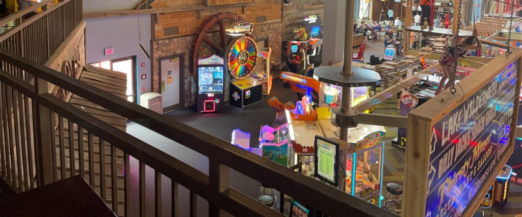 arcade view with games and fun activities like ropes course and bowling