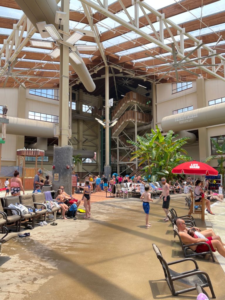 wilderness smokies indoor waterpark kids and adults in swimsuits