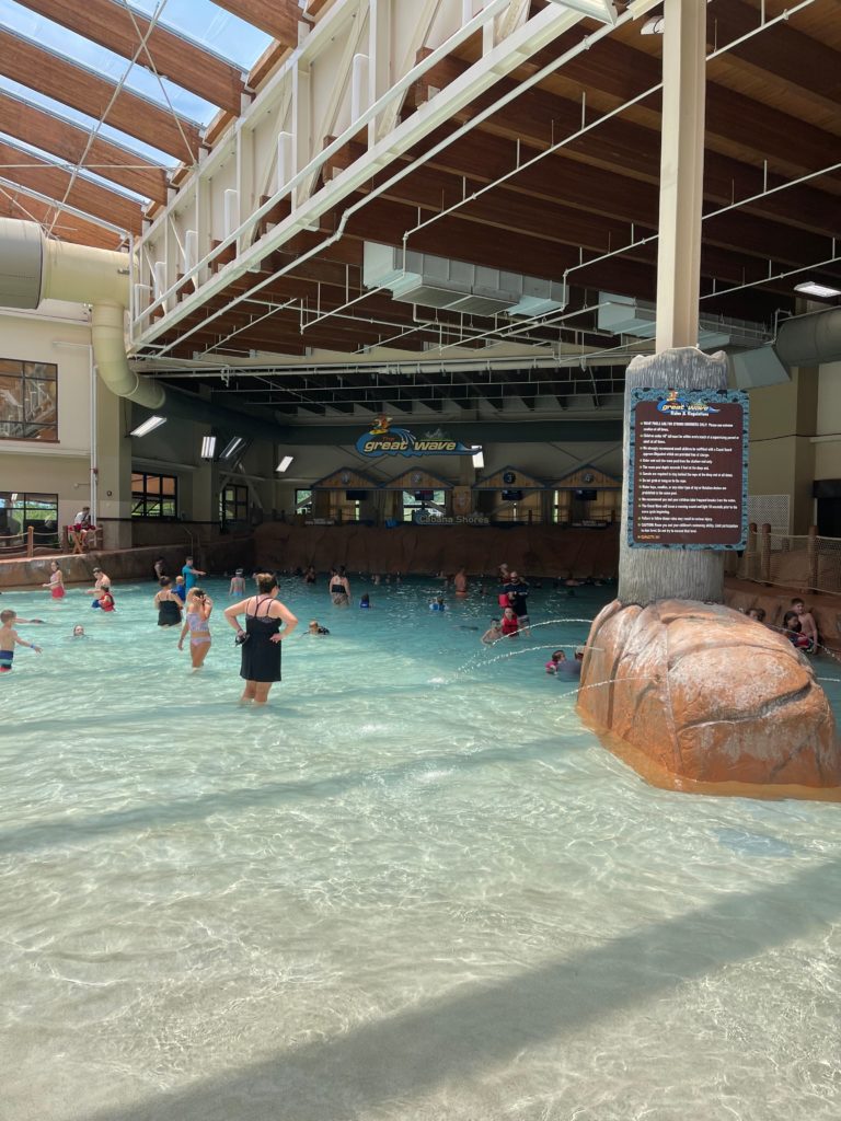 indoor water park view of wave pool people swimming
