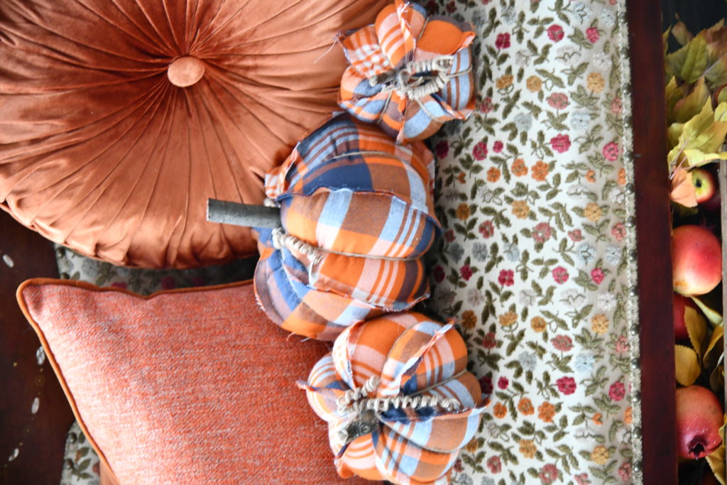 How To Beautifully Decorate Your Entryway For Fall plaid pumpkins