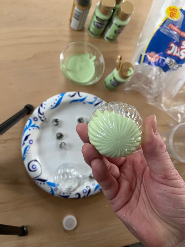 once paint is added to DIY jade ornaments start moving paint around