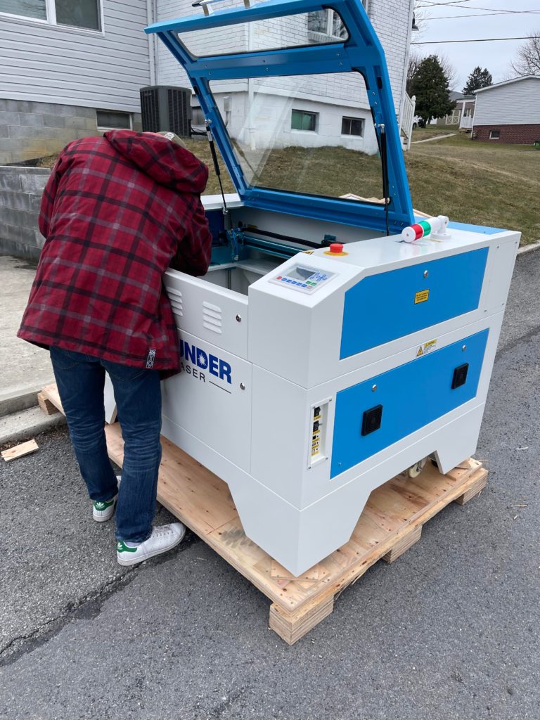 Unboxing crate with our new thunder laser nova 35 cutting machine