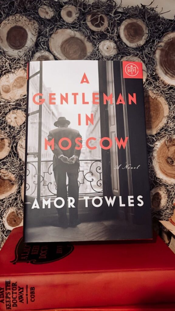 Book on a mantel A gentleman in Moscow by Amor Towles