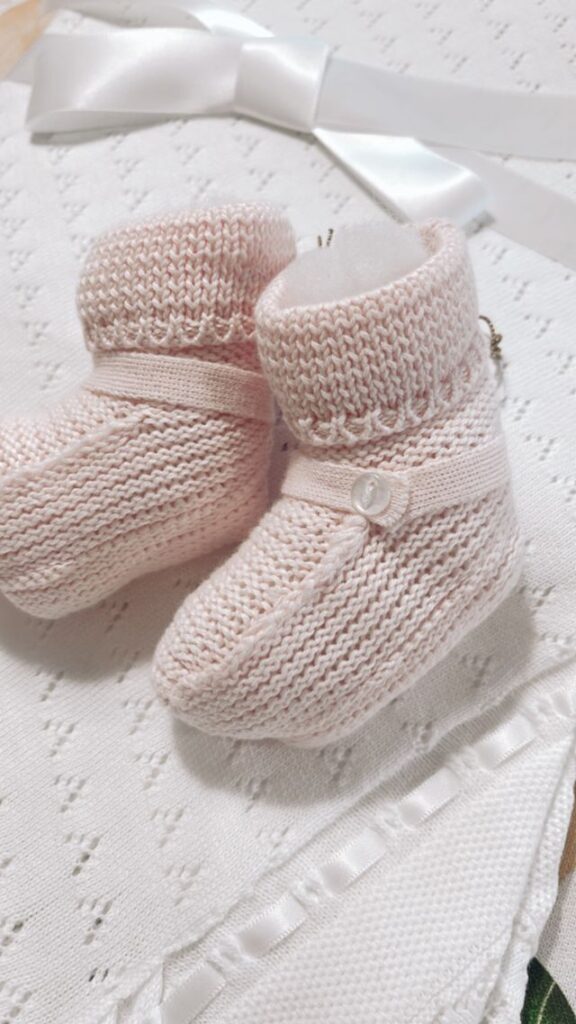 Curious About the Latest Trends in Baby Shower Gifting? Button strap knit booties