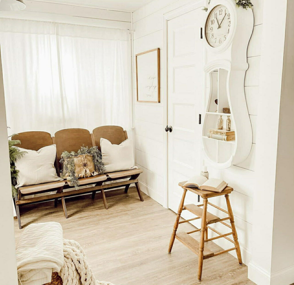 Farmhouse entryway with wooden bench, vintage Mora clock, and neutral styling
Rustic farmhouse entryway featuring a wood bench and antique Mora clock
Cozy farmhouse entryway styled with warm wood tones and classic Mora clock